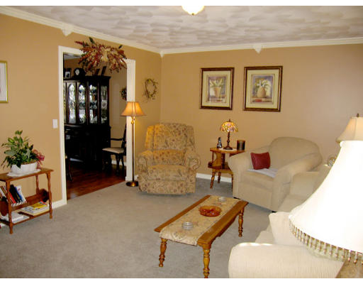 140 Cleveland Street Woonsocket, RI 02895 - Photo 11 of 26 a living room with furniture
