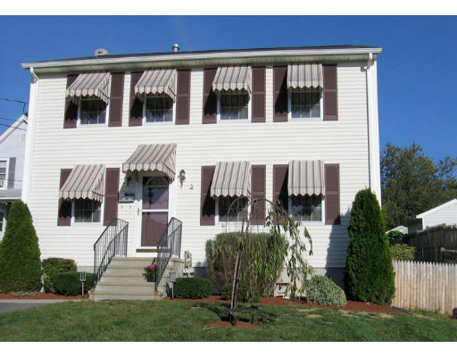 140 Cleveland Street Woonsocket, RI 02895 - Photo 24 of 26 a view of a building with a porch