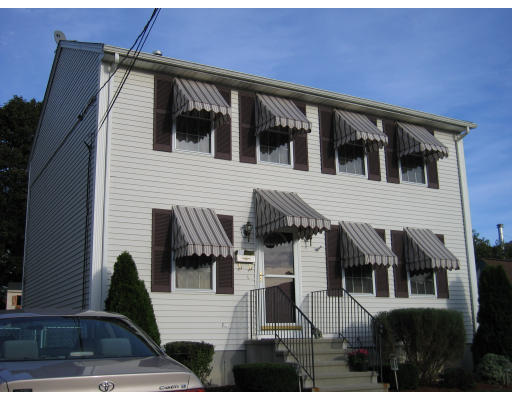 140 Cleveland Street Woonsocket, RI 02895 - Photo 25 of 26 a view of a house with a balcony