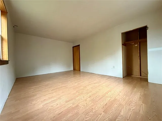 an empty room with window