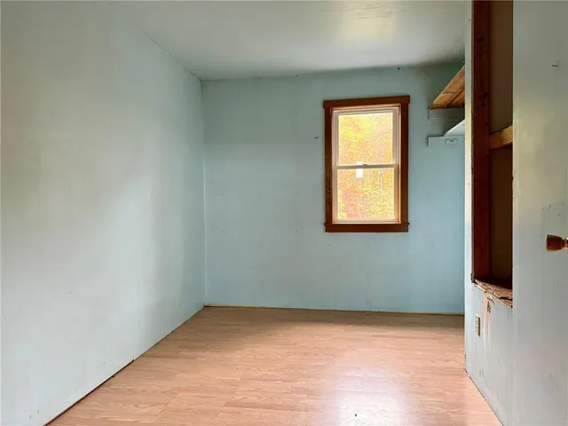 a view of a room that has a window in it