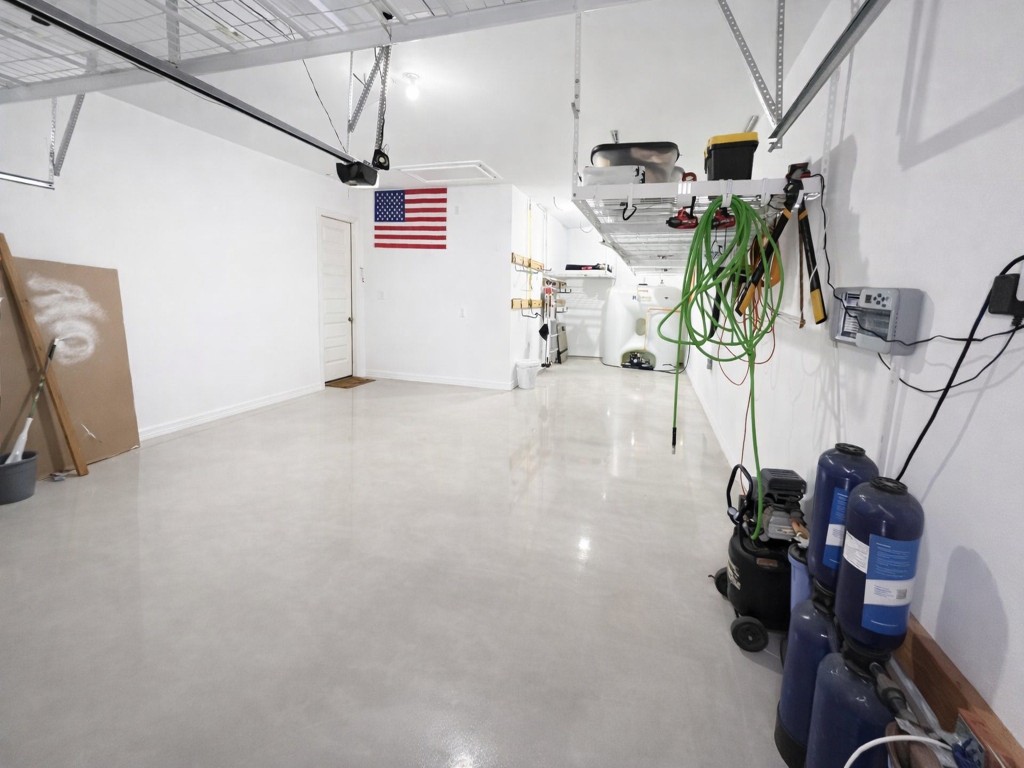 10407 Roseate Skimmer Conroe, TX 77385 - Photo 29 of 30 a view of storage and utility room