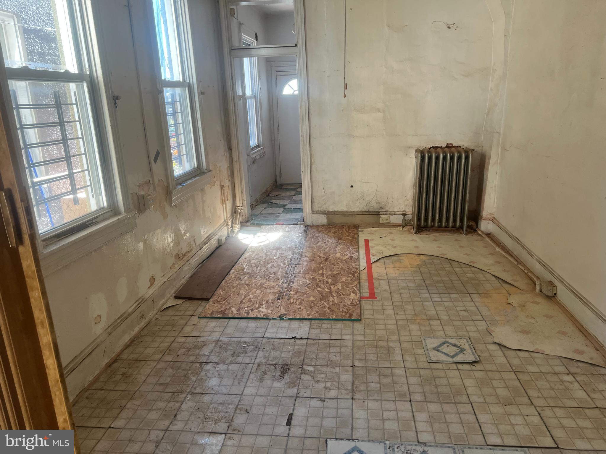 2211 Jefferson Street Baltimore, MD 21205 - Photo 4 of 13 a view of an empty room with a window