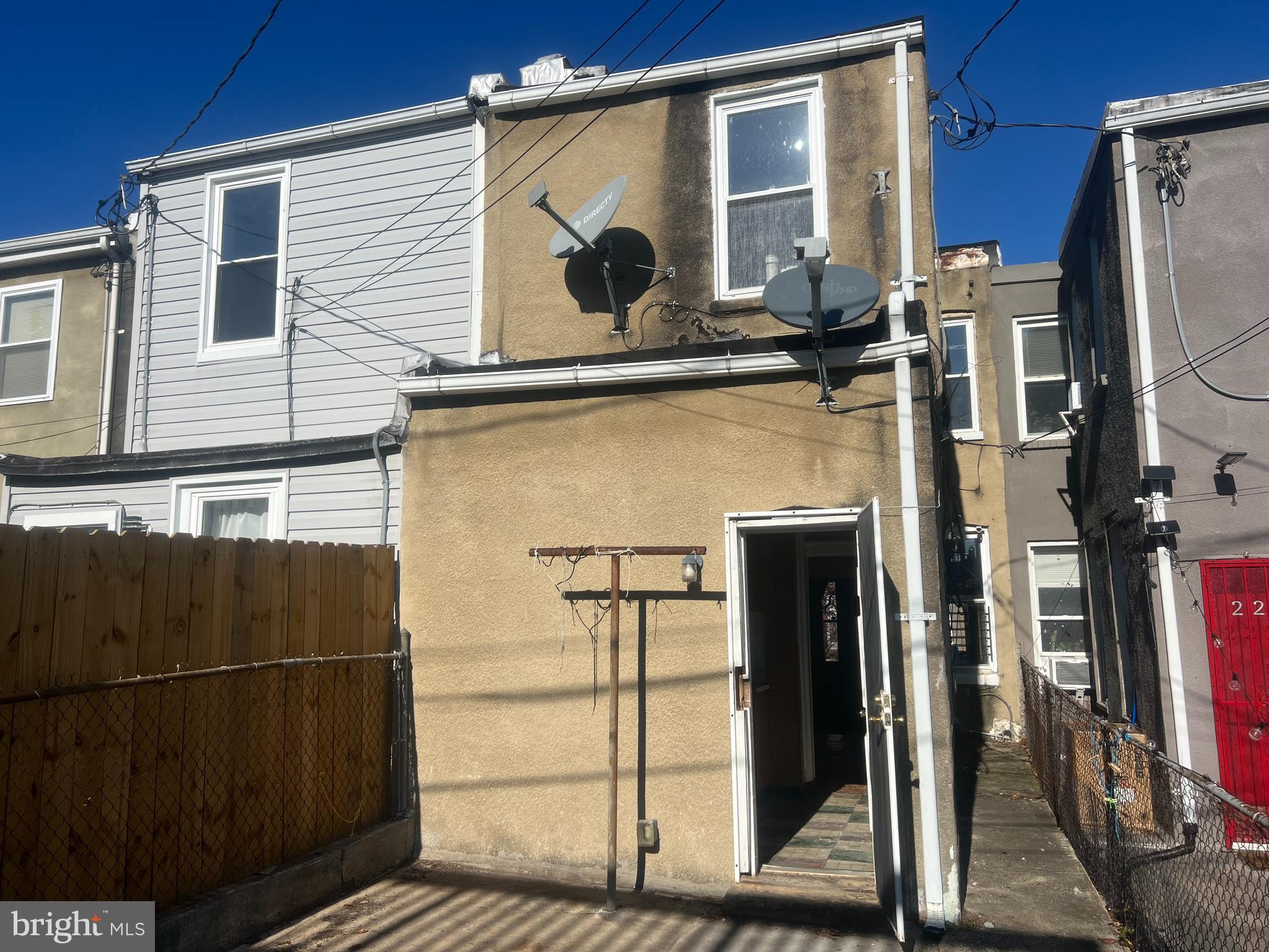 2211 Jefferson Street Baltimore, MD 21205 - Photo 7 of 13 a view of a house with a door and a chair
