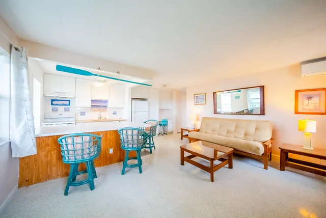 a living room with furniture and a table