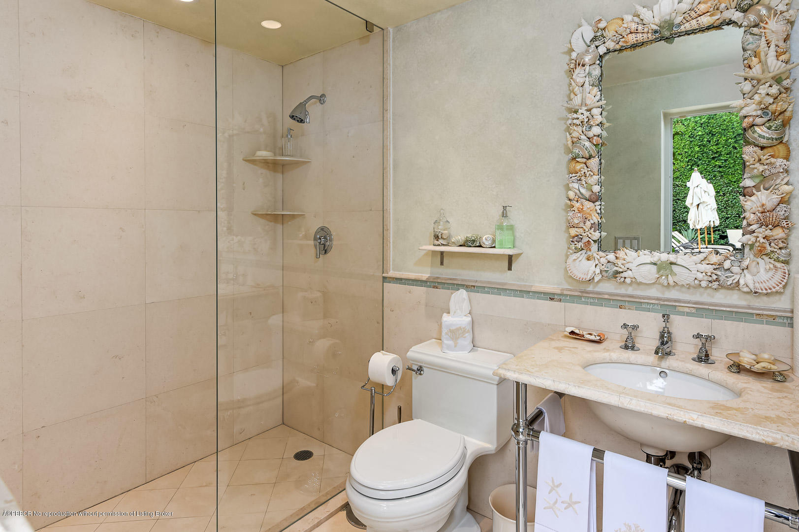 130 Cocoanut Row Palm Beach, FL 33480 - Photo 30 of 31 a bathroom with a granite countertop sink toilet and shower