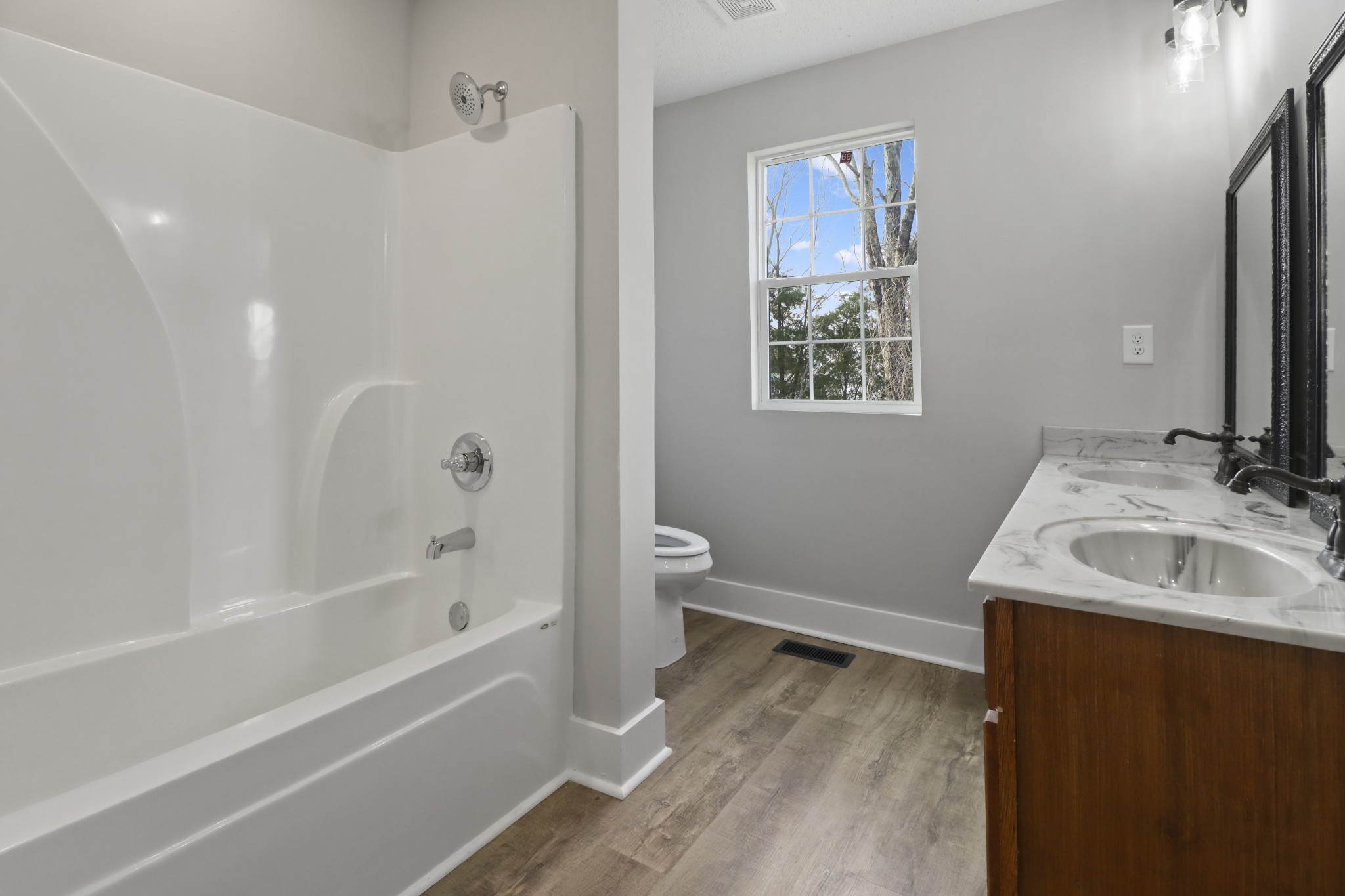 4845 Pulliam-Hardaway Road Springfield, TN 37172 - Photo 17 of 26 a bathroom with a sink and a mirror