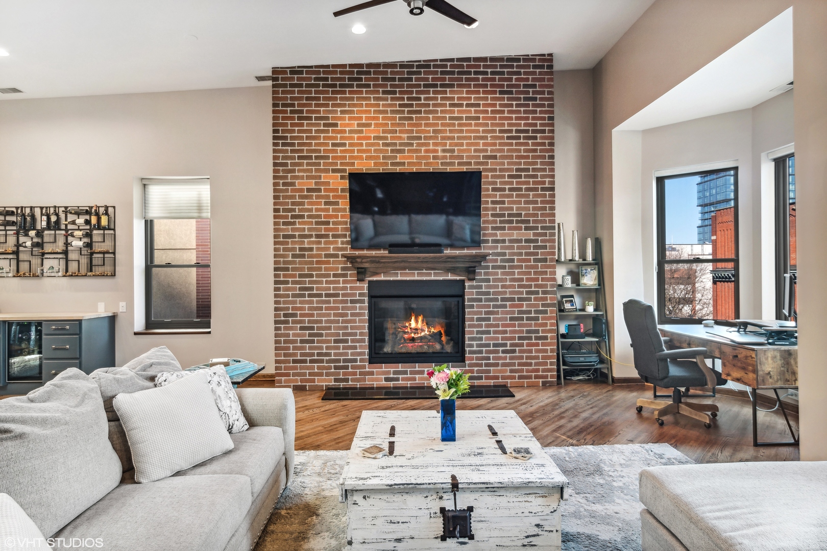 119 West Chestnut Street, Unit 4W Chicago, IL 60610 - Photo 5 of 18 a living room with furniture and a fireplace