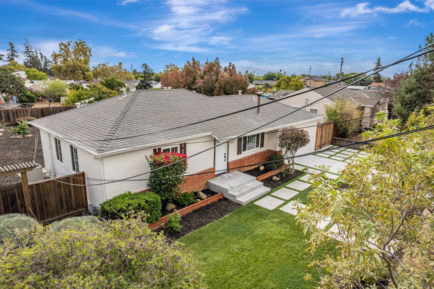 3972 Pepper Tree Lane San Jose, CA 95127 - Photo 2 of 59 an aerial view of a house with swimming pool garden and patio