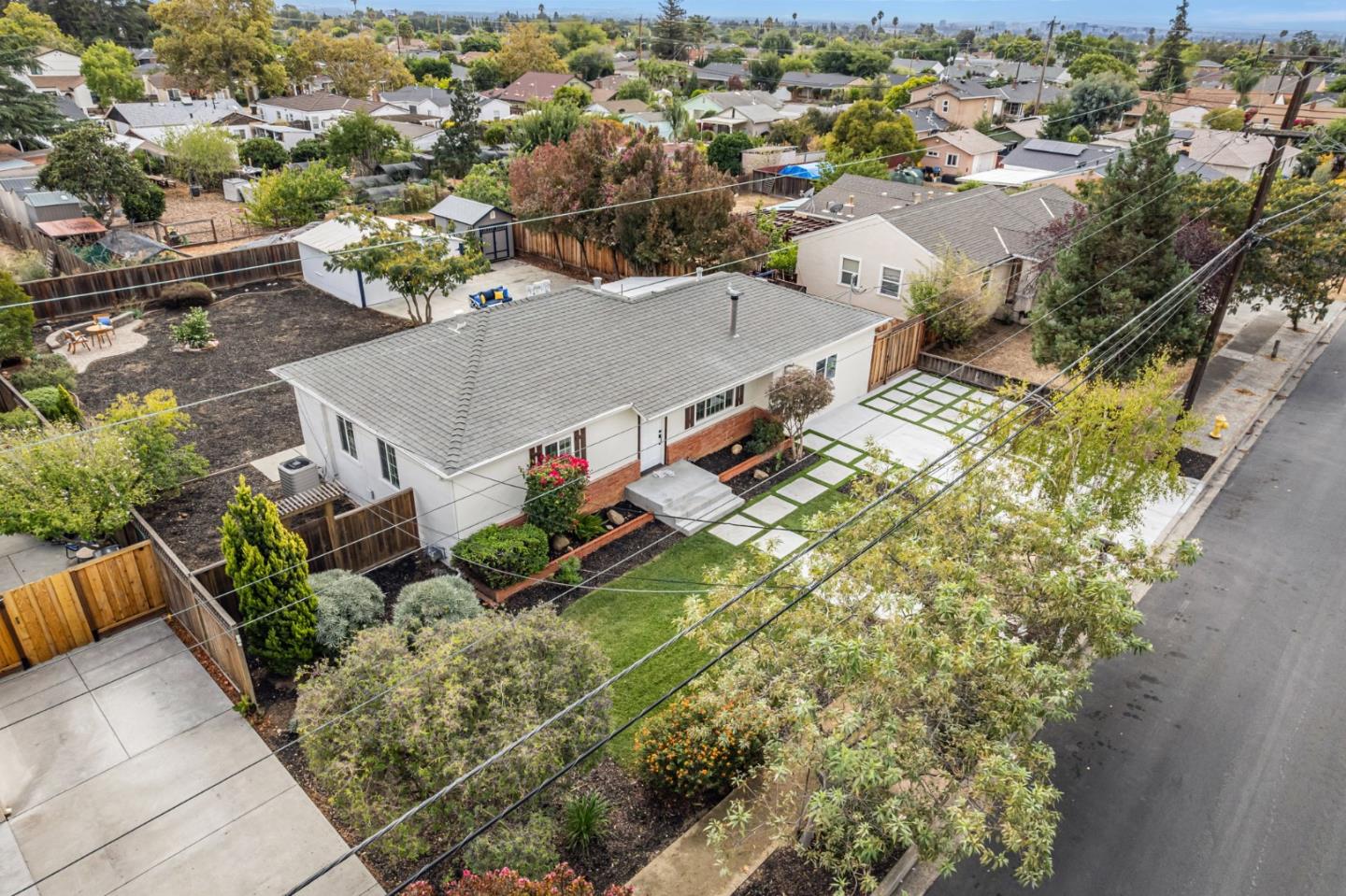 3972 Pepper Tree Lane San Jose, CA 95127 - Photo 3 of 59 an aerial view of a house with a yard basket ball court and outdoor seating