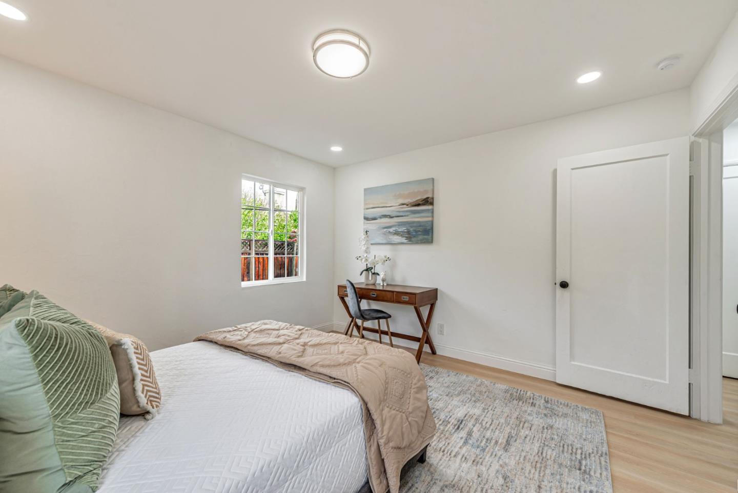 3972 Pepper Tree Lane San Jose, CA 95127 - Photo 35 of 59 a bedroom with a bed and a window