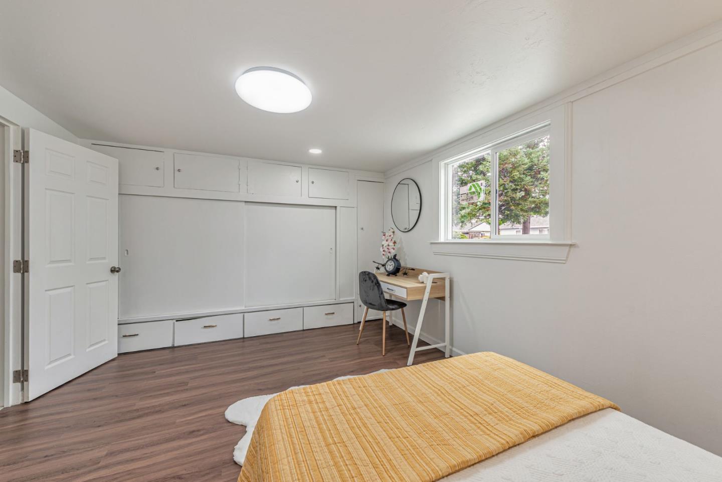 3972 Pepper Tree Lane San Jose, CA 95127 - Photo 42 of 59 a bedroom with a bed and a desk