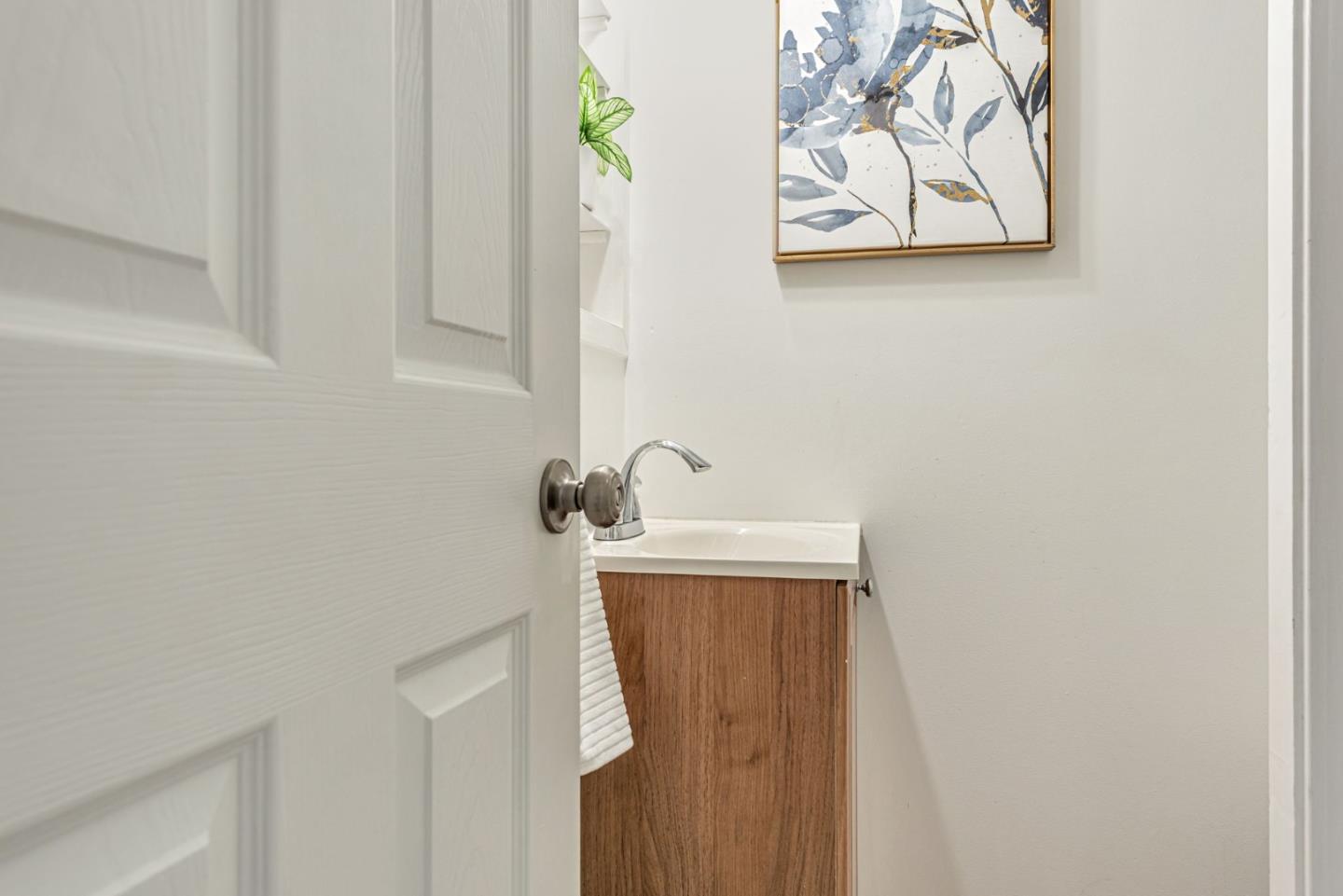 3972 Pepper Tree Lane San Jose, CA 95127 - Photo 46 of 59 a bathroom with a sink and a mirror