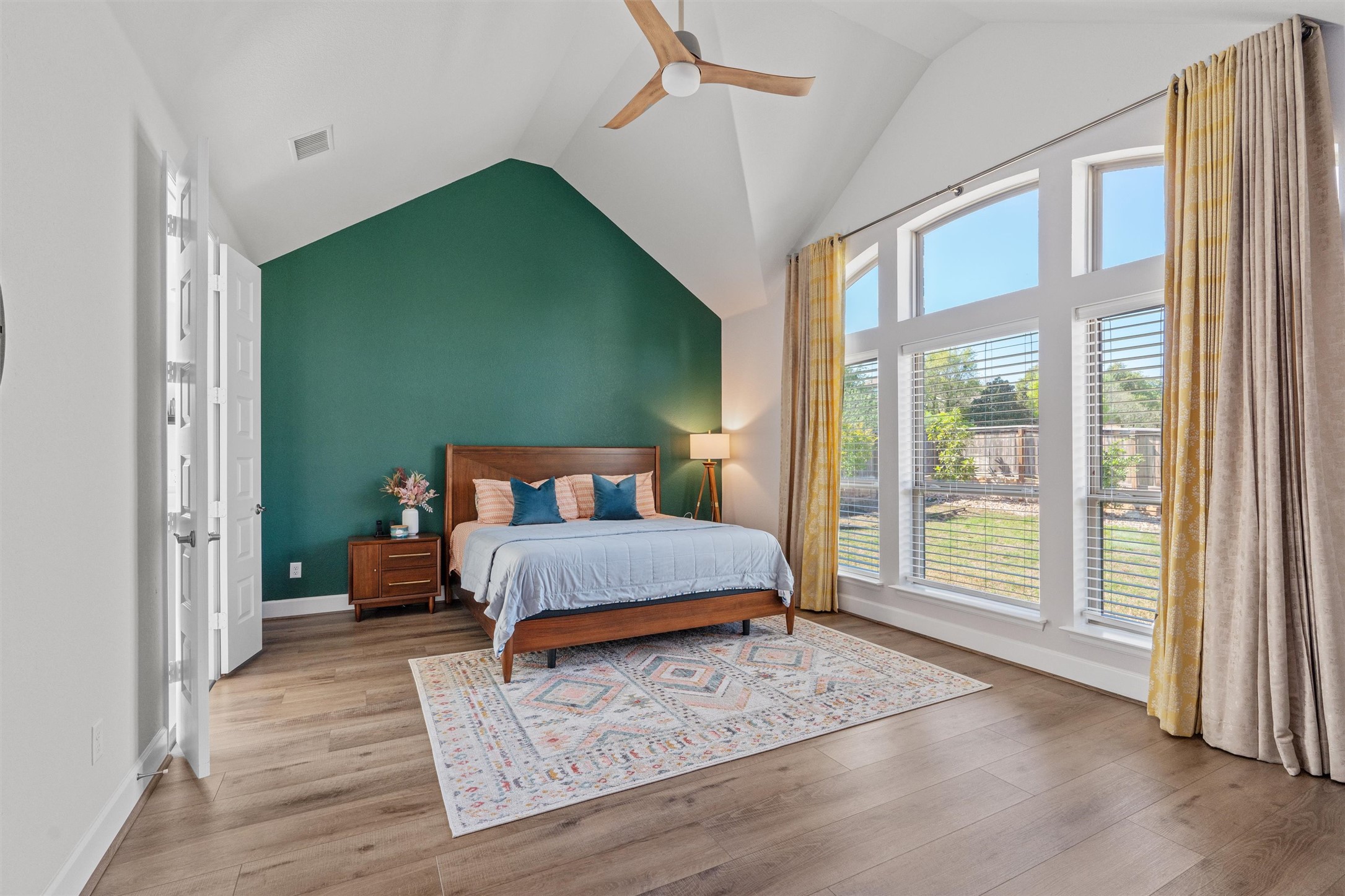 101 Pienza Drive Georgetown, TX 78628 - Photo 19 of 40 a bedroom with a bed and a large window