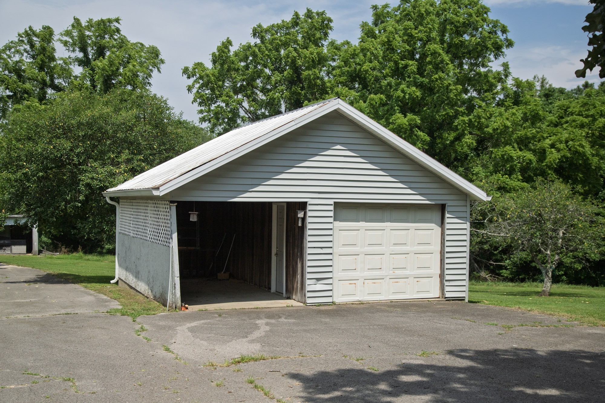 1125 Dawson Road White Bluff, TN 37187 - Photo 40 of 57 a view of house with a yard and garage