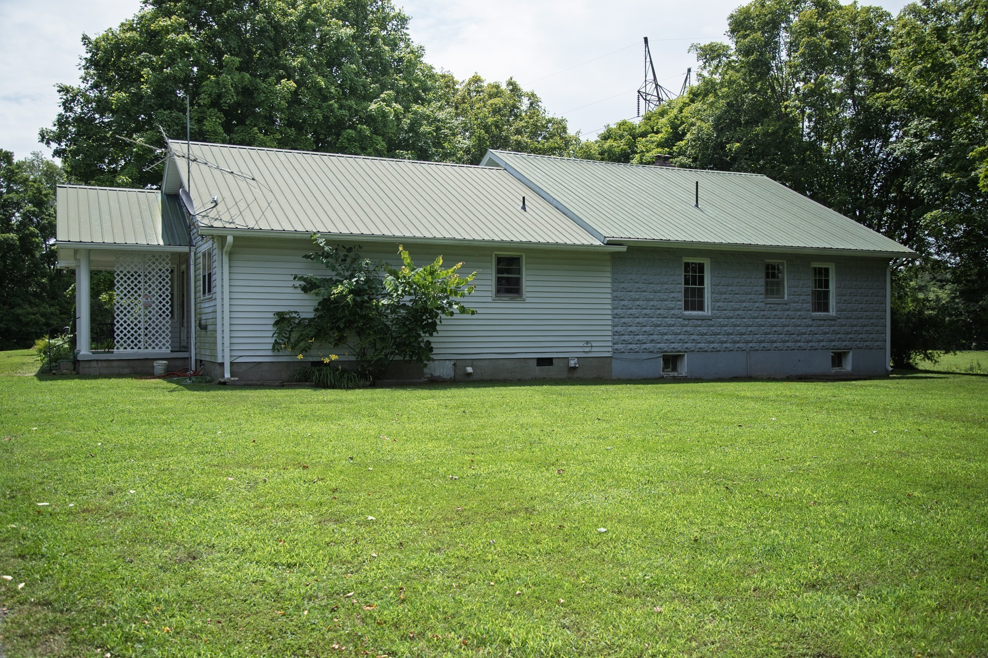 1125 Dawson Road White Bluff, TN 37187 - Photo 41 of 57 a front view of a house with a garden