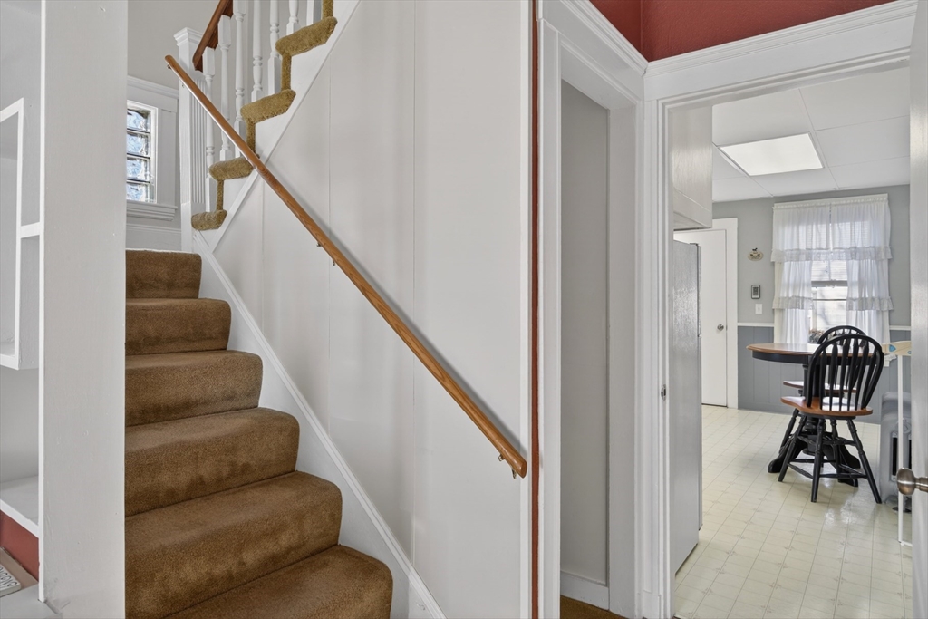 63 Marlboro Street Dedham, MA 02026 - Photo 26 of 40 a view of entryway and hall with wooden floor