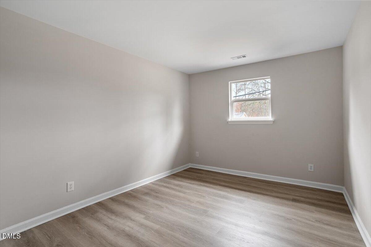 3306 Prudence Street Durham, NC 27704 - Photo 20 of 22 wooden floor in an empty room