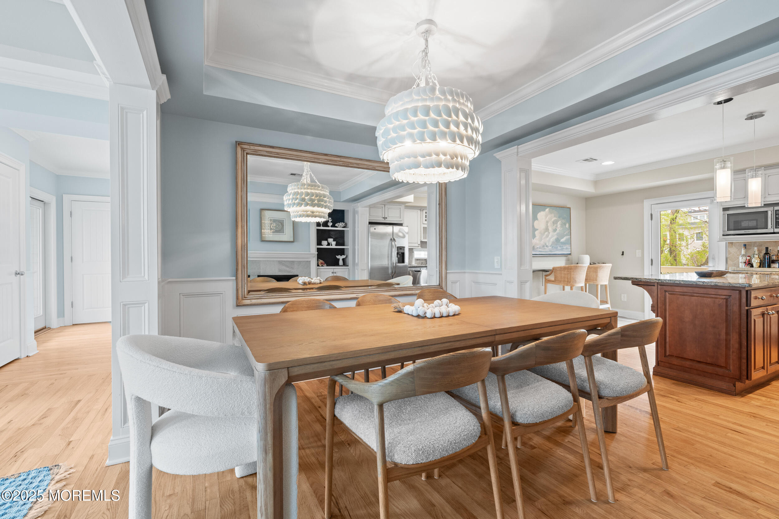 5 Shrewsbury Way Sea Bright, NJ 07760 - Photo 15 of 59 a view of a dining room with furniture a chandelier and wooden floor