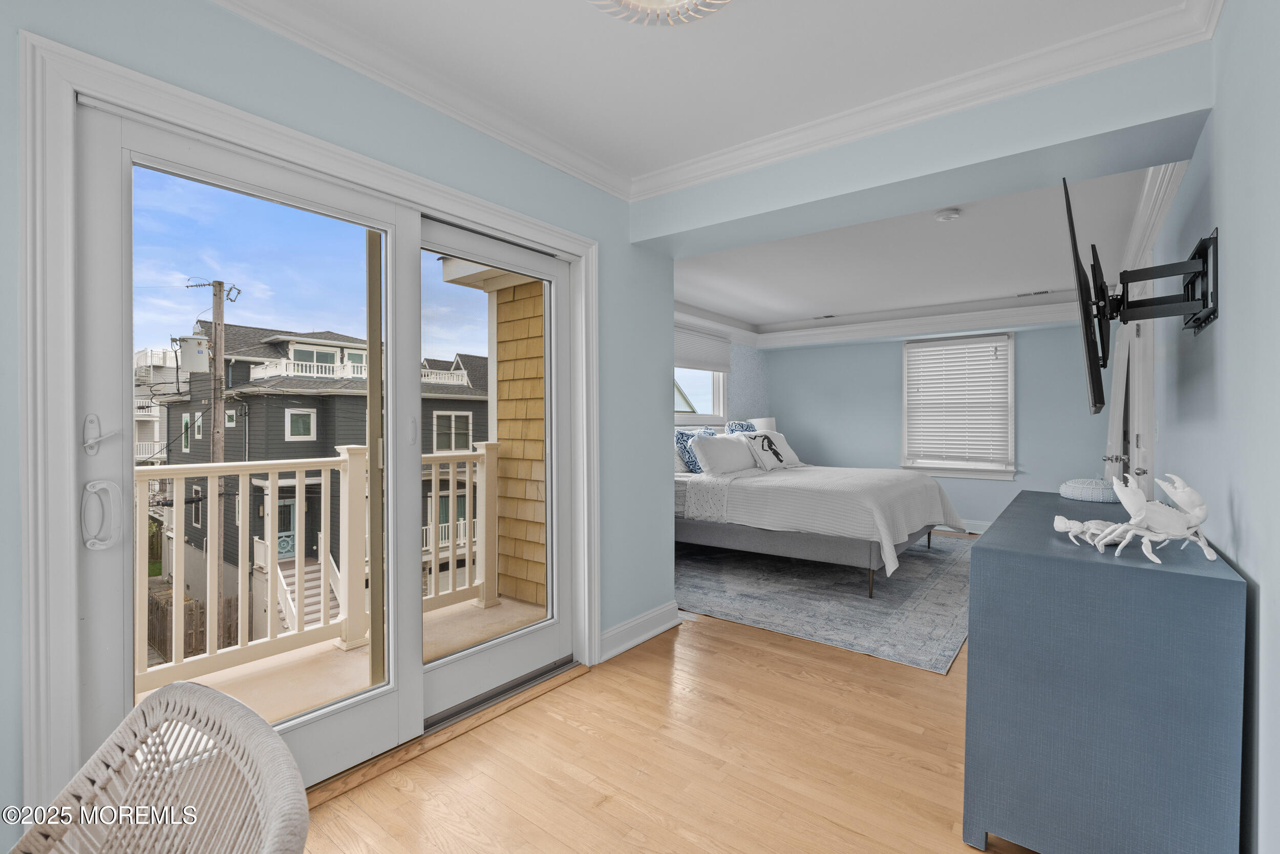 5 Shrewsbury Way Sea Bright, NJ 07760 - Photo 28 of 59 a bedroom with furniture and a window