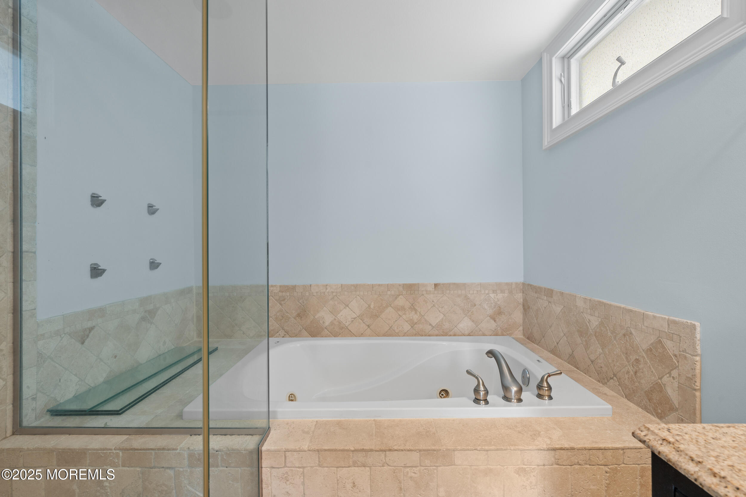 5 Shrewsbury Way Sea Bright, NJ 07760 - Photo 32 of 59 a bathroom with a bathtub and a shower