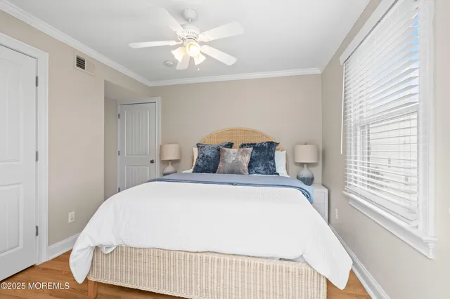a living room with furniture and windows
