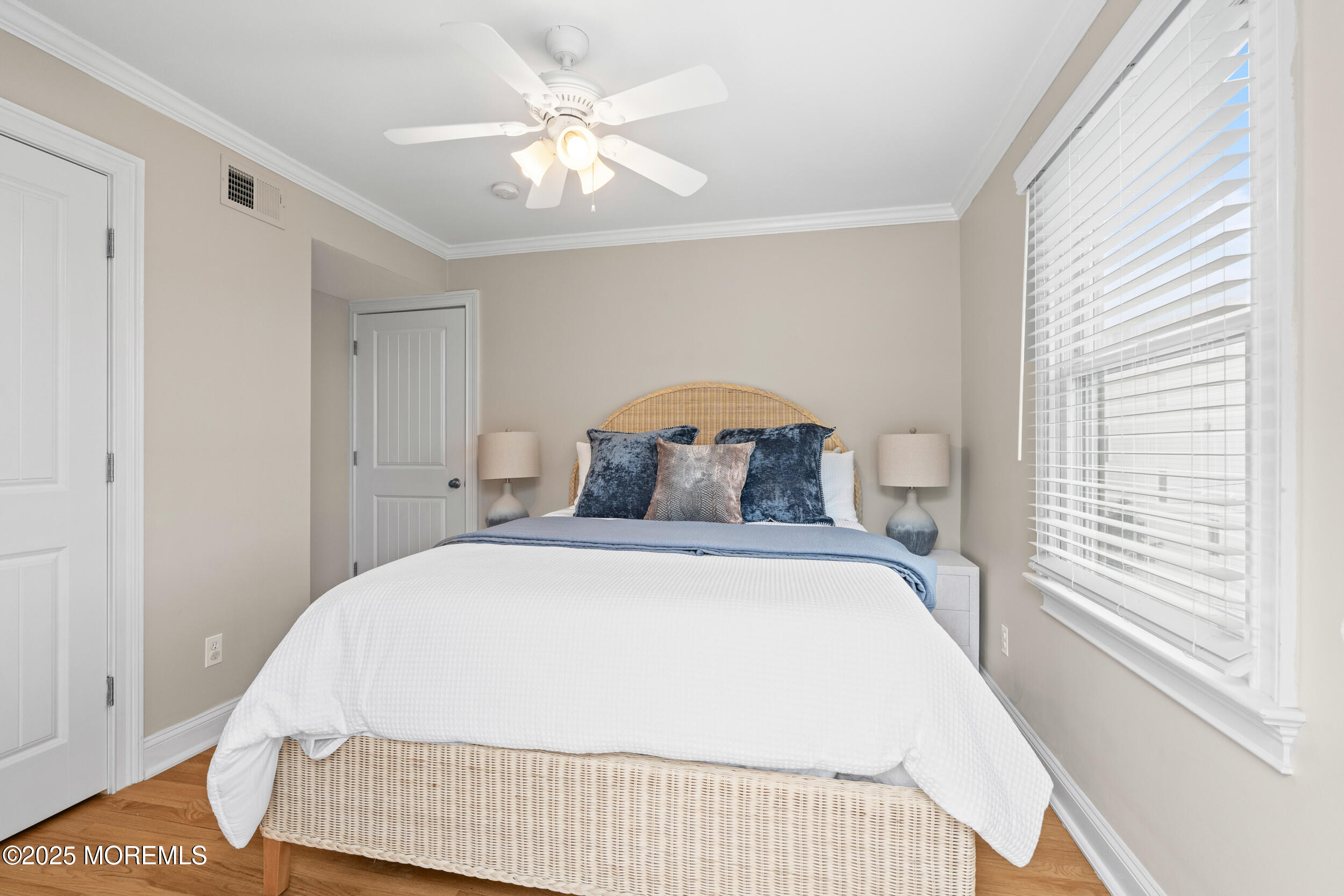 5 Shrewsbury Way Sea Bright, NJ 07760 - Photo 35 of 59 a bedroom with a bed and a window