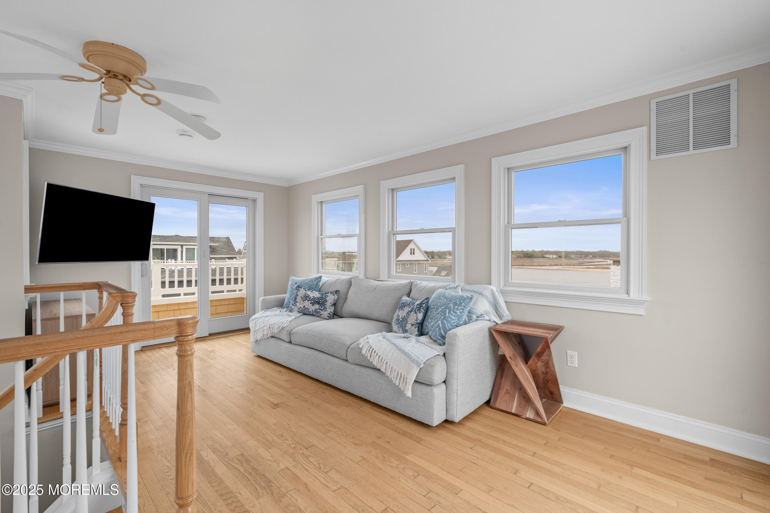 5 Shrewsbury Way Sea Bright, NJ 07760 - Photo 41 of 59 a living room with furniture and a flat screen tv