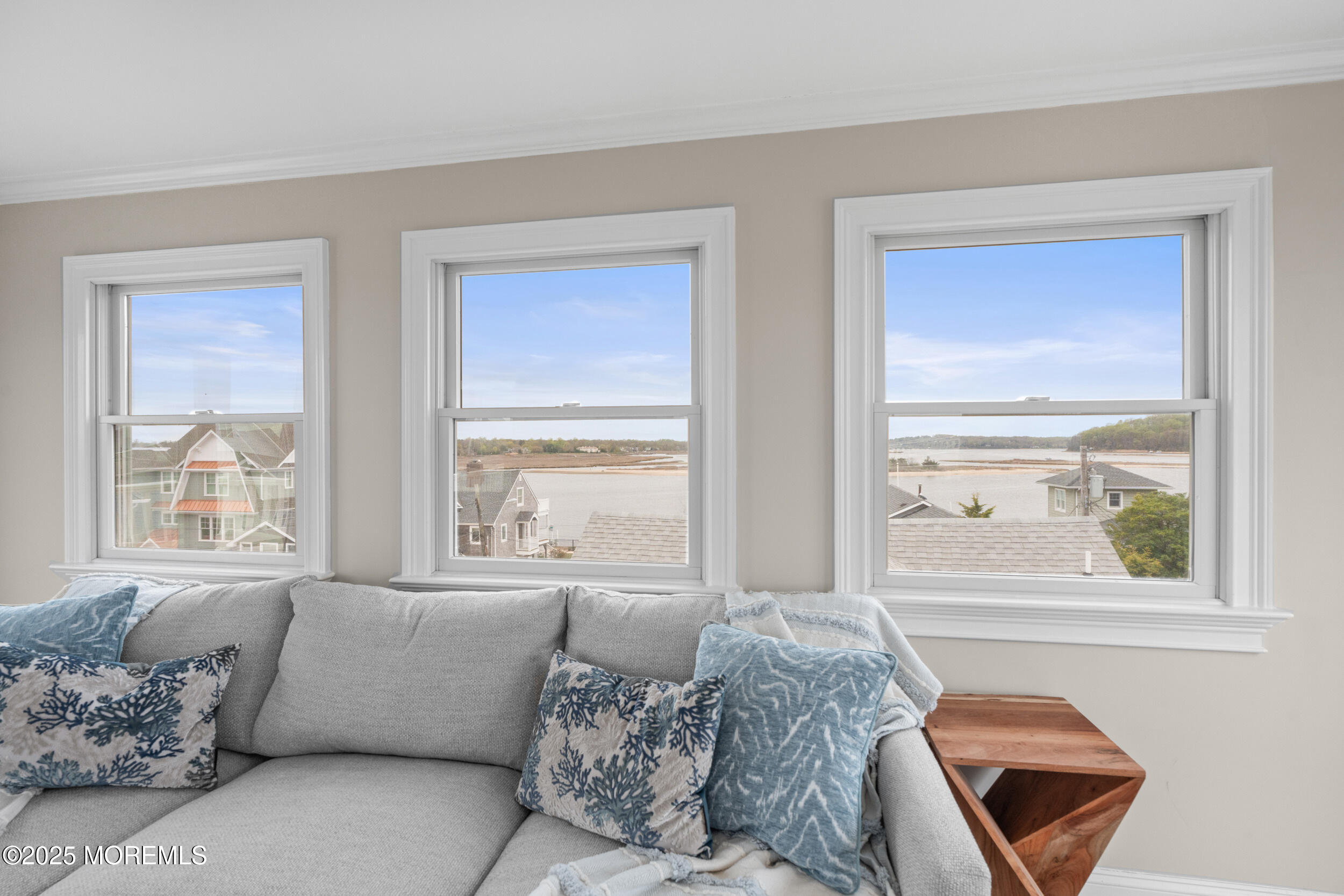 5 Shrewsbury Way Sea Bright, NJ 07760 - Photo 43 of 59 a bedroom with a bed and a couch with window