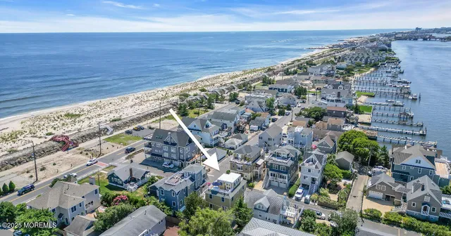 an aerial view of beach and ocean