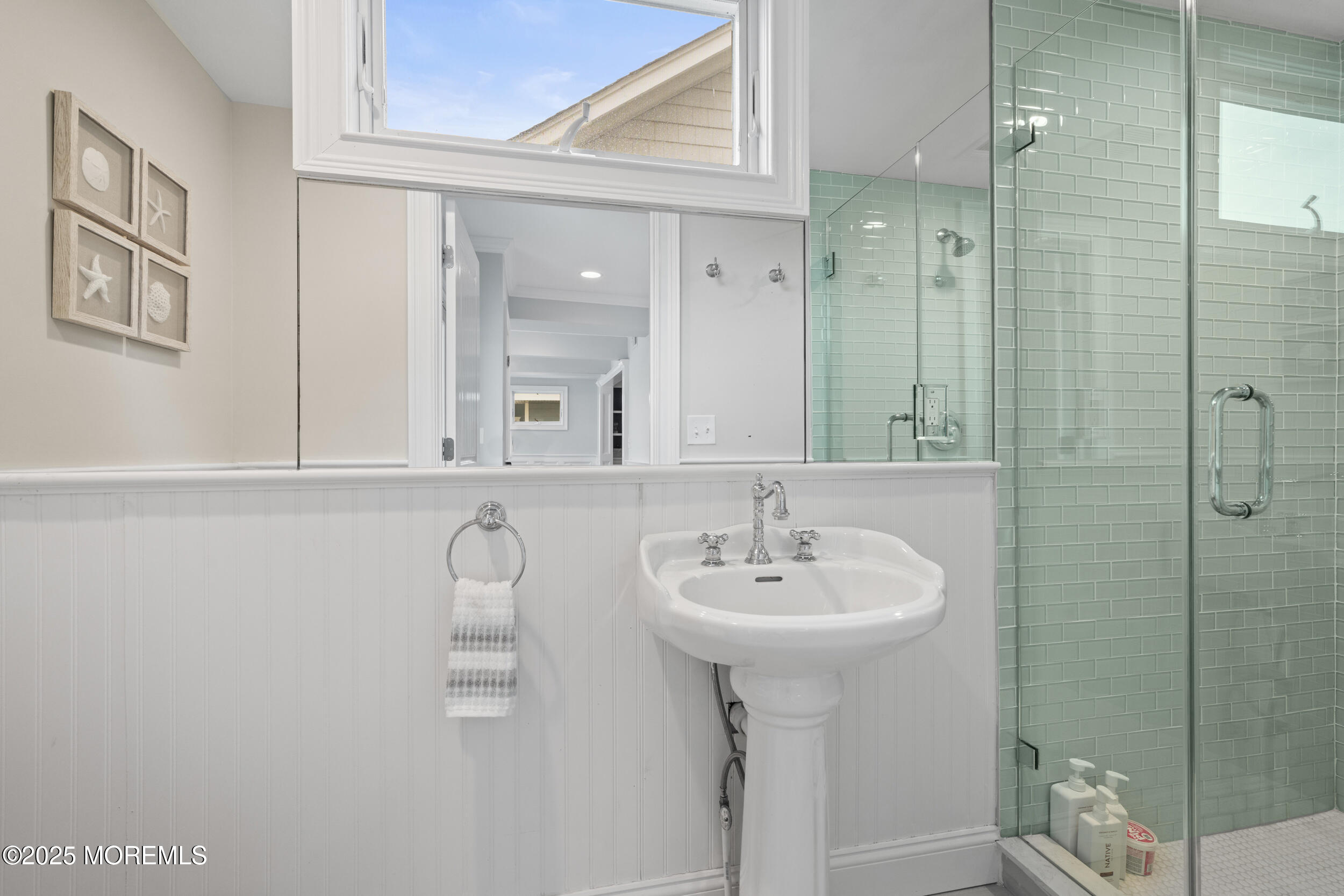 5 Shrewsbury Way Sea Bright, NJ 07760 - Photo 55 of 59 a bathroom with a sink and mirror