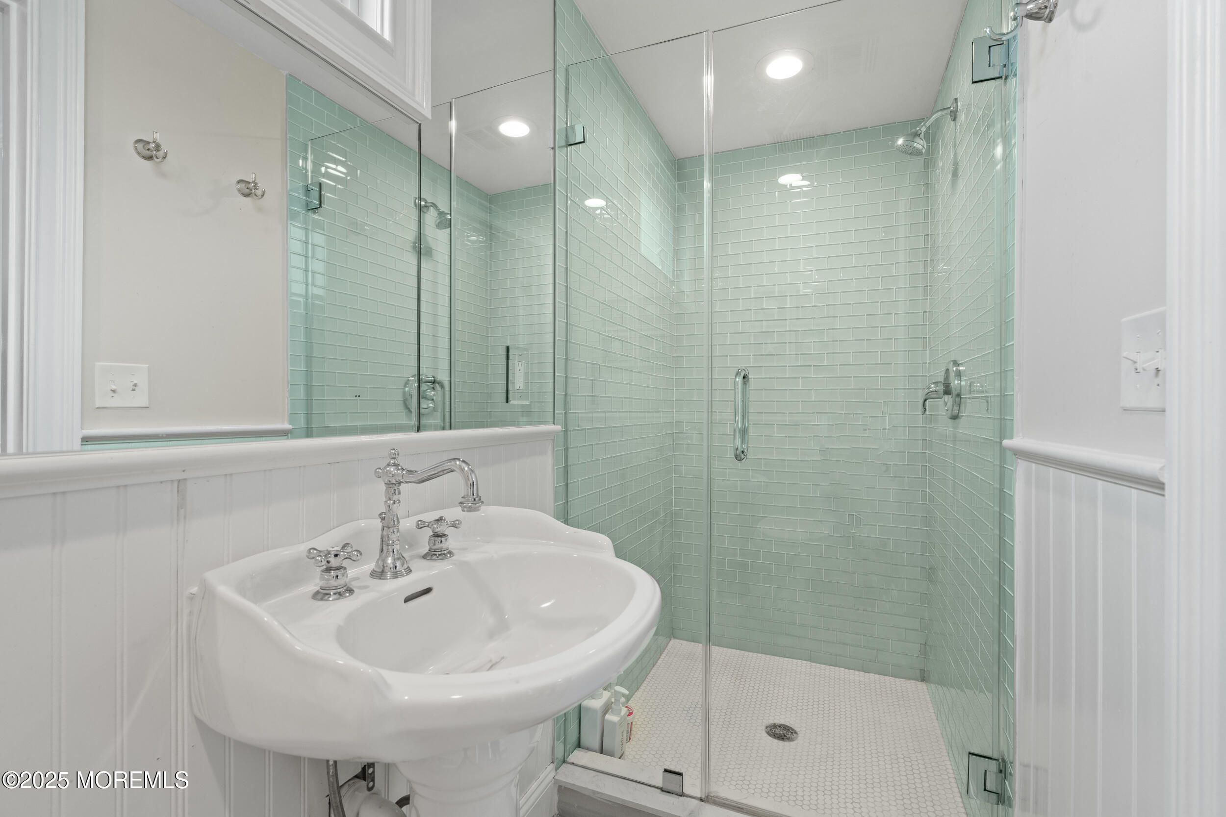 5 Shrewsbury Way Sea Bright, NJ 07760 - Photo 56 of 59 a bathroom with a sink a shower and a mirror