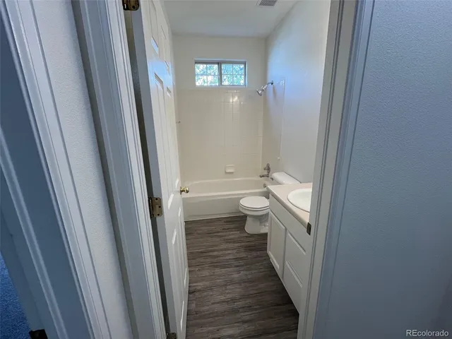 a bathroom with a sink and toilet