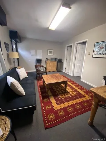 a bed sitting in a room next to a window