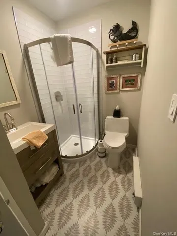 a bathroom with a sink and toilet