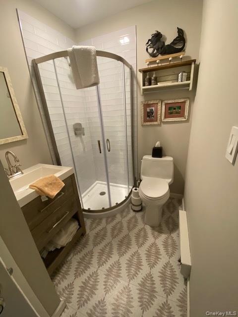 127 Indian Hill Road Bedford, NY 10506 - Photo 5 of 6 a bathroom with a sink and toilet