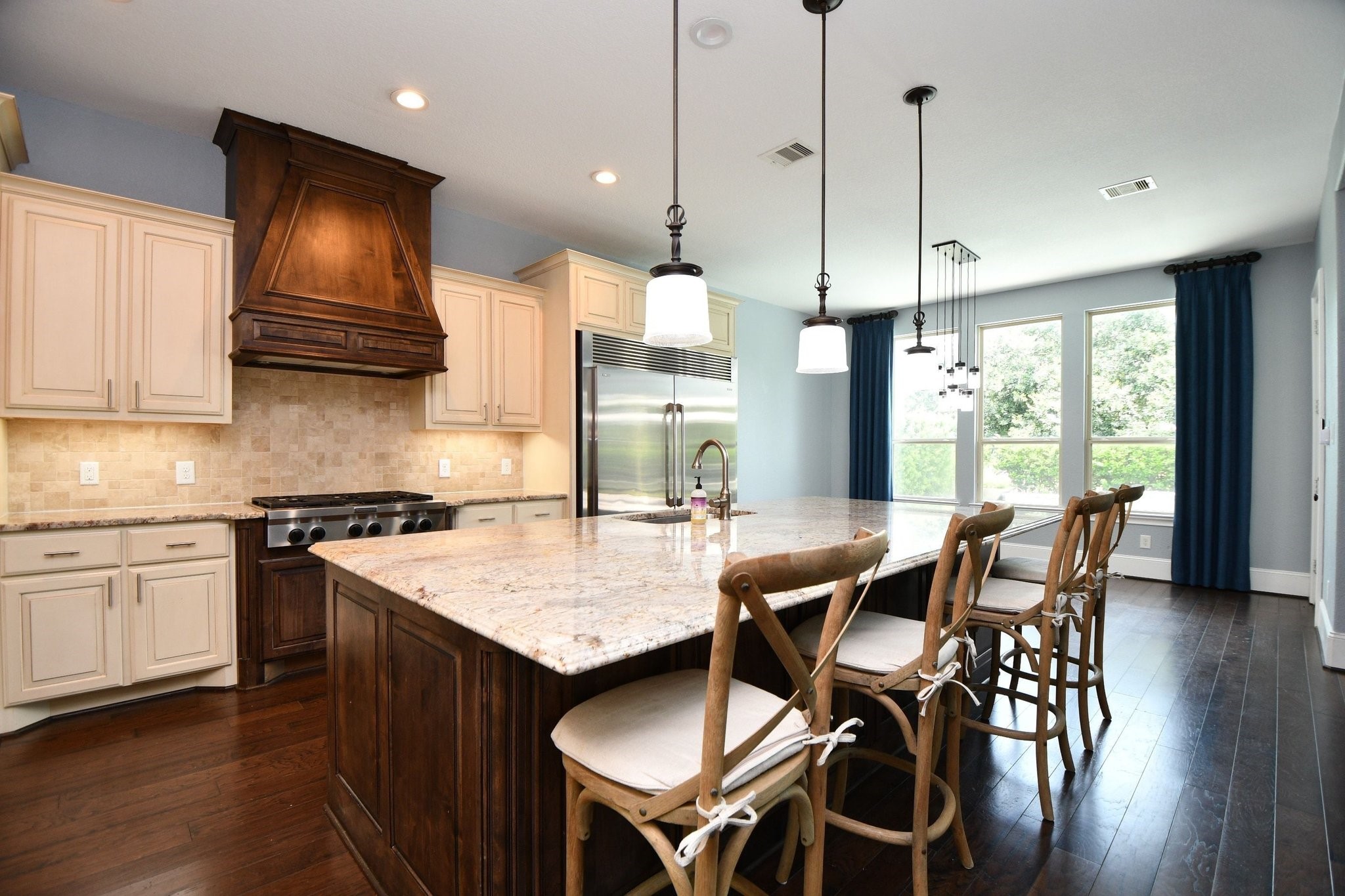 24914 Bay Mist Ridge Lane Katy, TX 77494 - Photo 45 of 50 Super view of the open bright kitchen with the island breadfast bar.