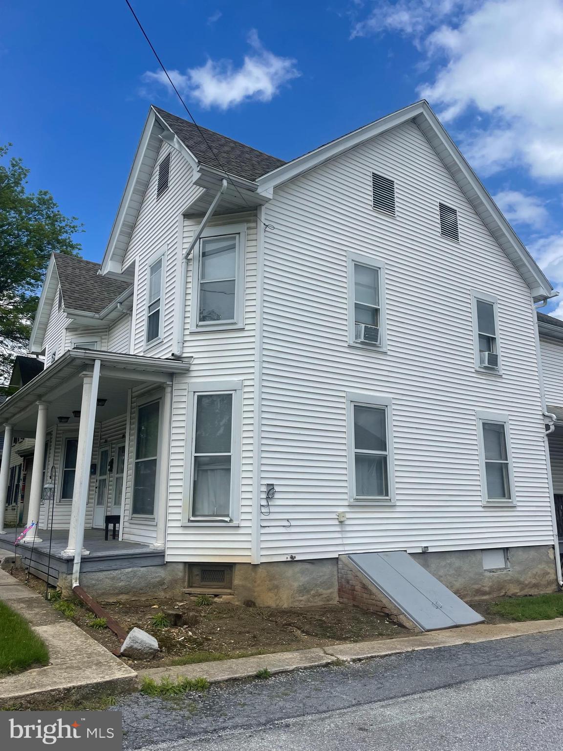 17 Cumberland Avenue Shippensburg, PA 17257 - Photo 2 of 12 a front view of a house with yard