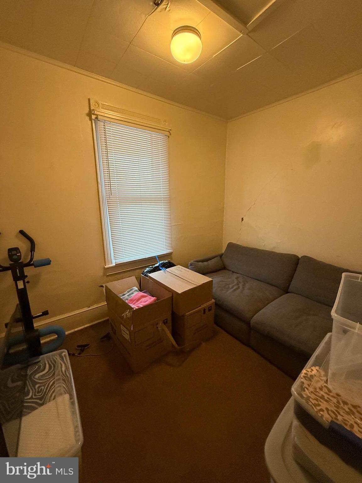 17 Cumberland Avenue Shippensburg, PA 17257 - Photo 9 of 12 a living room with a couch and a table