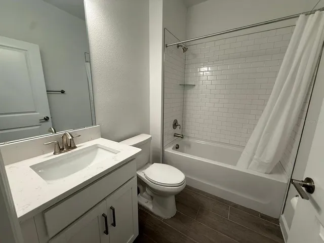 a large kitchen with cabinets