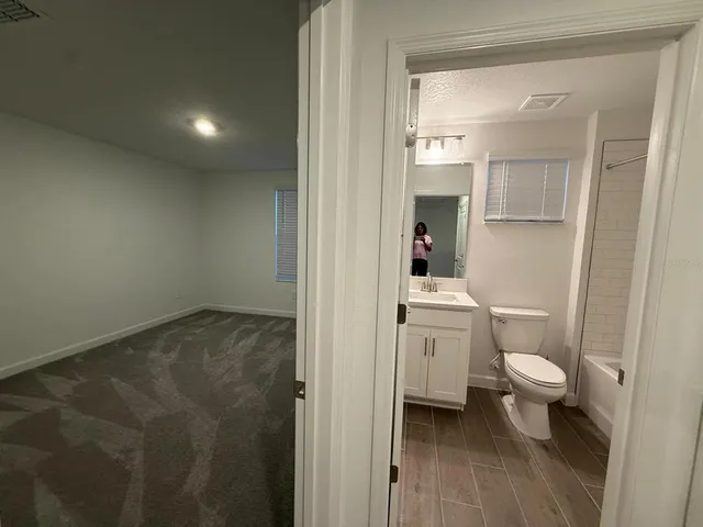 a view of a room with racks on the wall