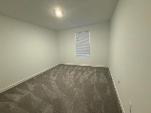 a bathroom with a sink toilet a shower and a mirror