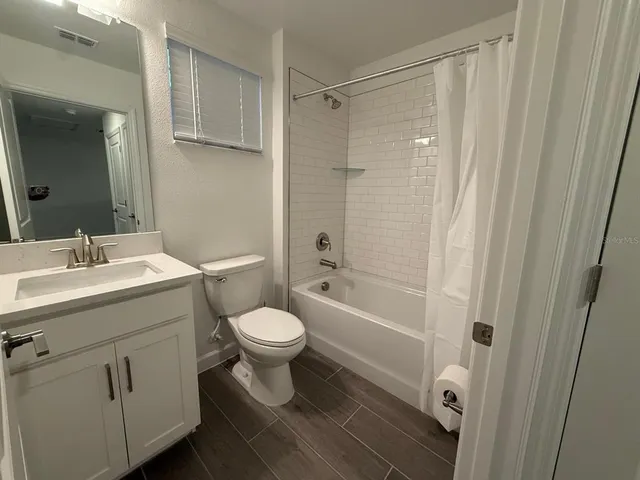 a view of a porch with a big yard