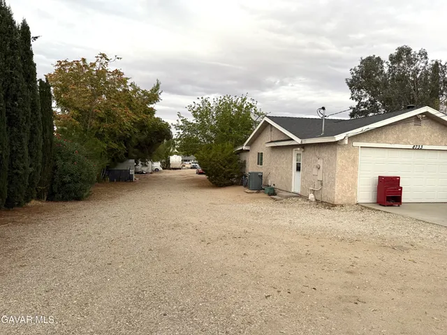 a view of a house with a outdoor space