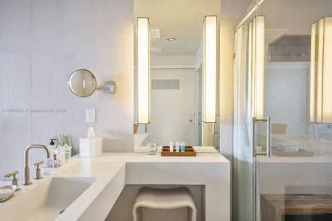 a bathroom with a bathtub and a sink