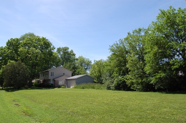 2160 Dehne Road Northbrook, IL 60062 - Photo 10 of 15 a big house with a big yard and large trees