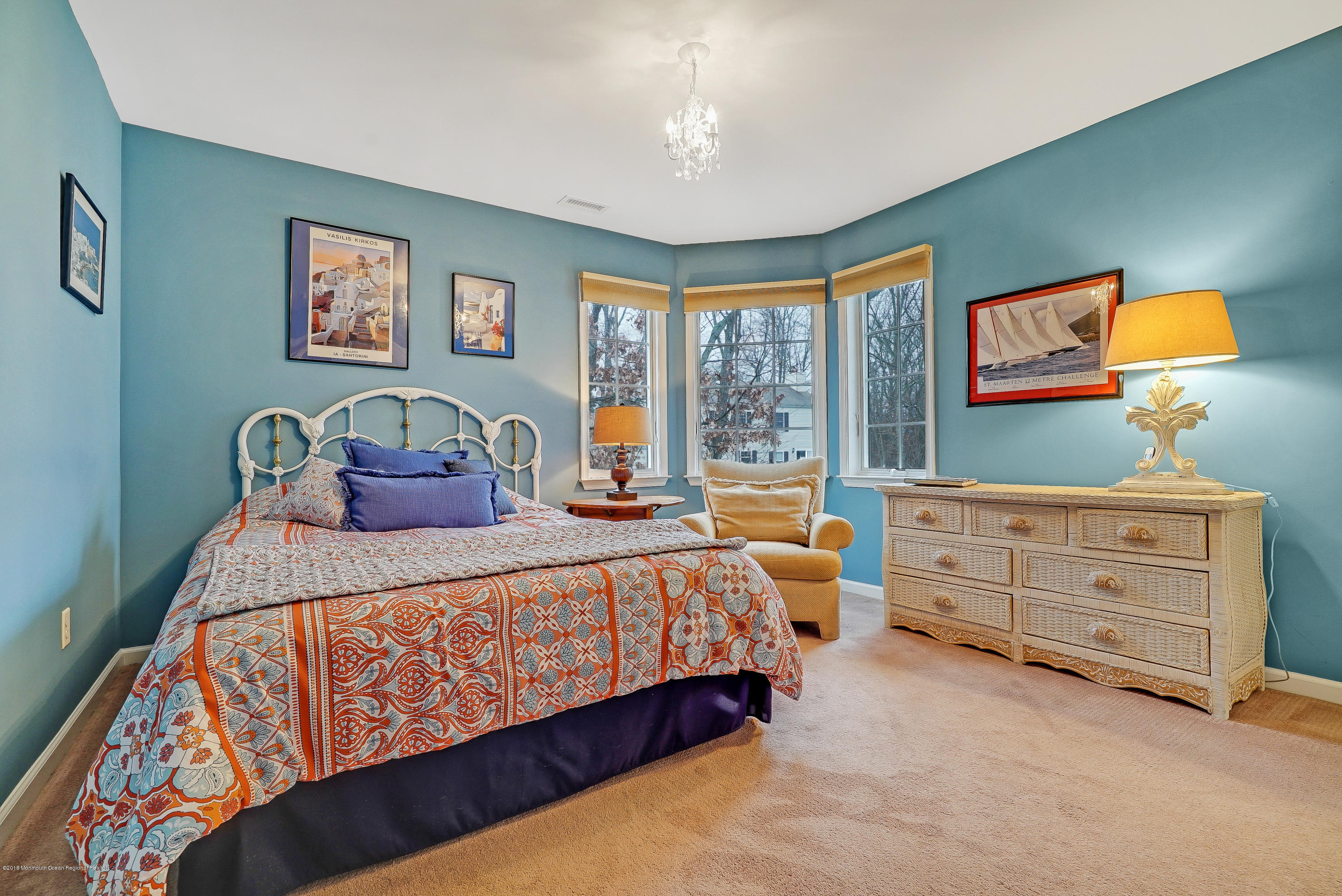18 Mariners Bend Brielle, NJ 08730 - Photo 21 of 31 a bed room with a bed and a dresser