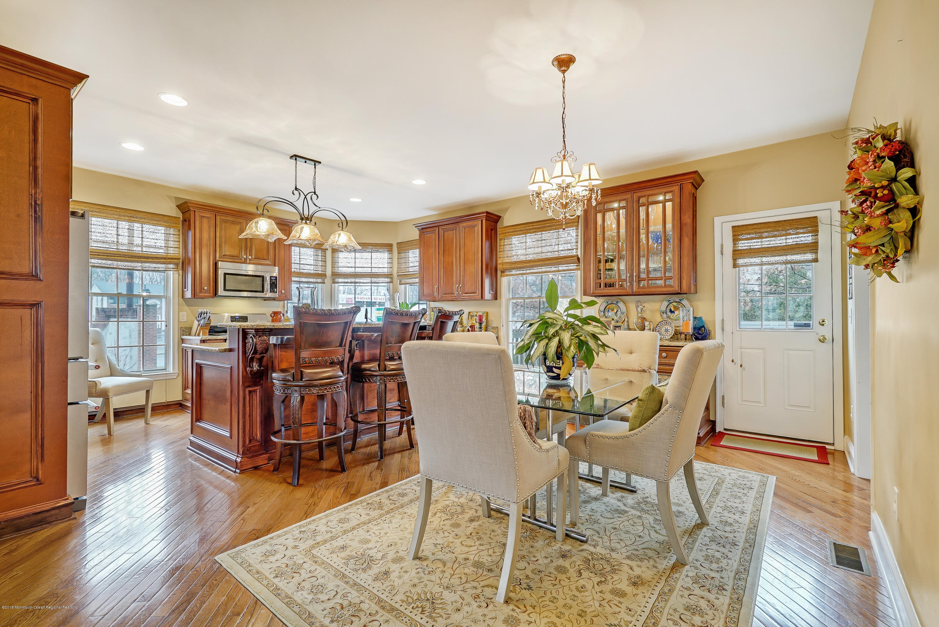 18 Mariners Bend Brielle, NJ 08730 - Photo 10 of 31 a view of a dining room with furniture window and wooden floor