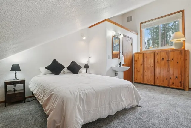 a view of a balcony with furniture