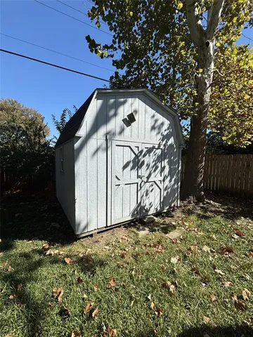 a view of backyard and tree